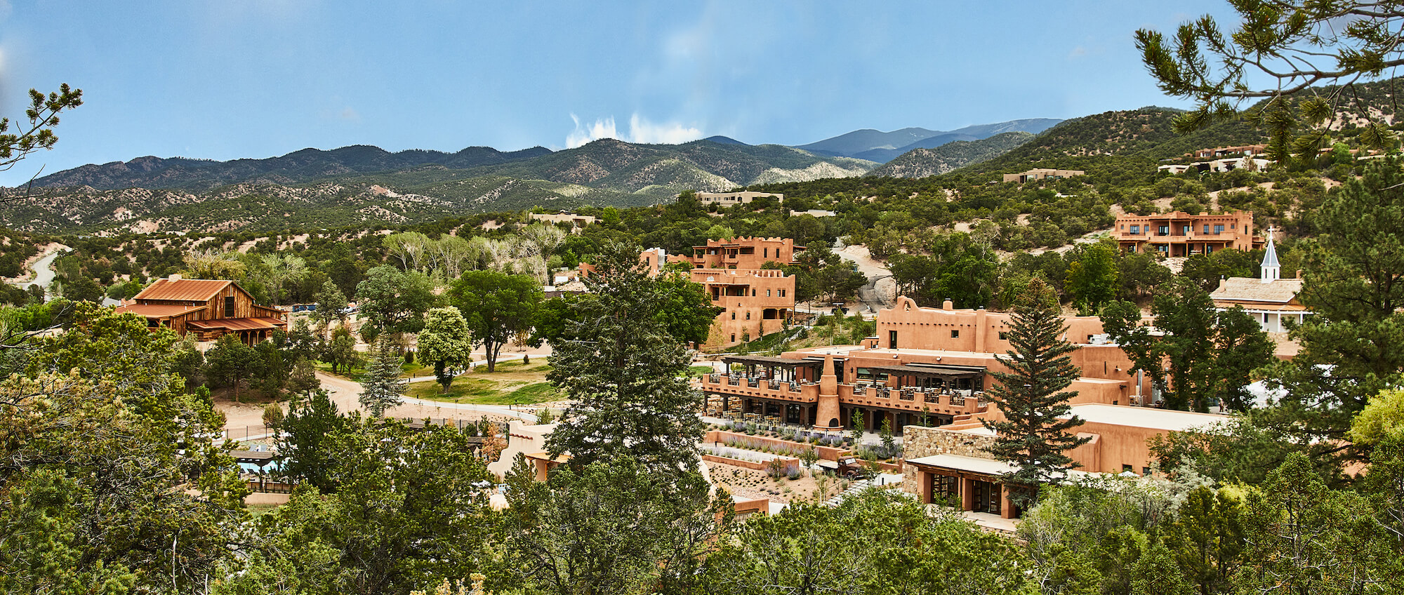 Adobe hotel in mountain setting