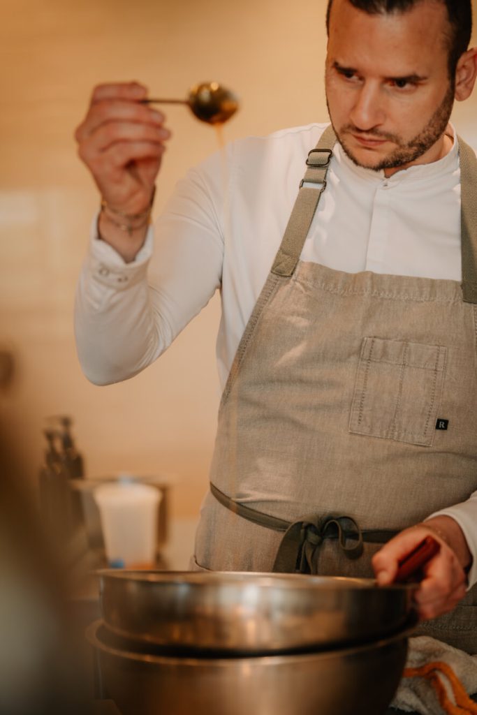 Chef Anthony Stagnaro preparing dish