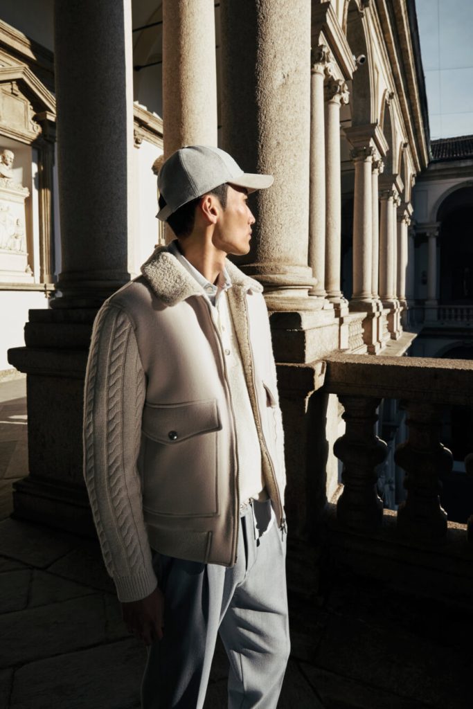 A male model for Eleventy wearing beige clothes