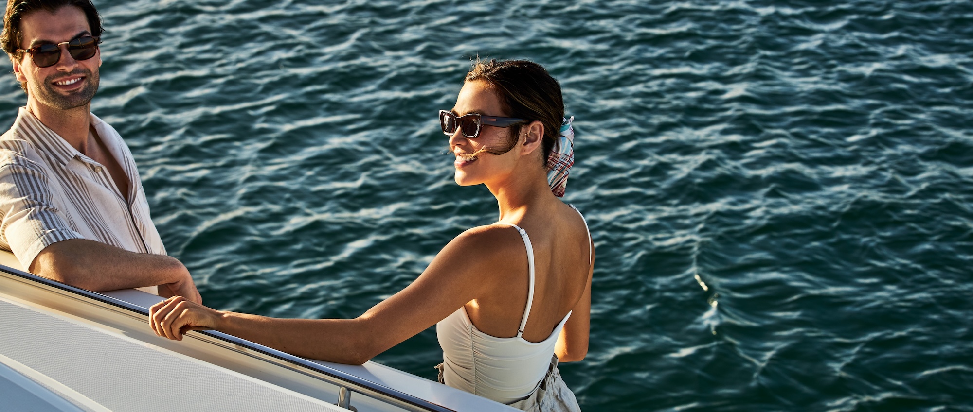 A couple relaxing on a boat